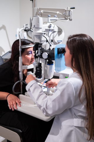 A photo of an eye exam being done